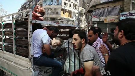 Wounded_civilians_arrive_at_hospital_Aleppo