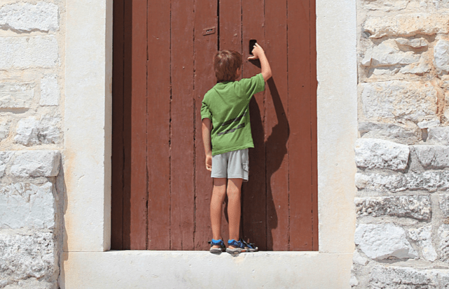 Boy at Church Door